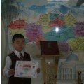 The pupil of 4 class Zholdasbai Zhandar  was awarded  the  2nd  place in the regional rating contest  “Tanym – 2014” 
